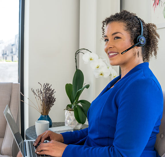 Woman wearing LH470 computer headset